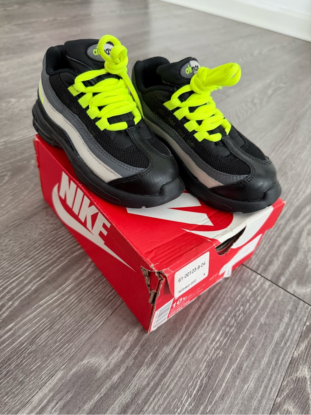 Nike Kids Black Sneakers with Neon Yellow Laces